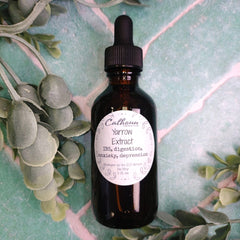 Bottle of yarrow extract with dropper on a green leafy background. Herbal apothecary DuBois Pa