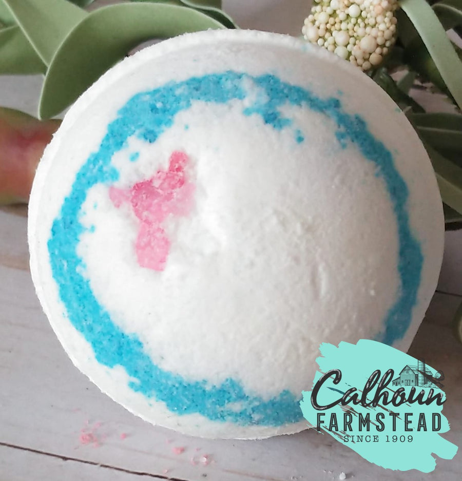 Wild passion bath bomb. White with blue swirls and pink salt details. Perfect for birthday gifts or favors.