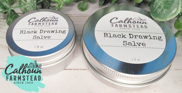 Black drawing salve tins. 1oz and 2oz. Drawing salves made with dried herbs for drawing out infections, bites, bee stings, splinters, slivers.