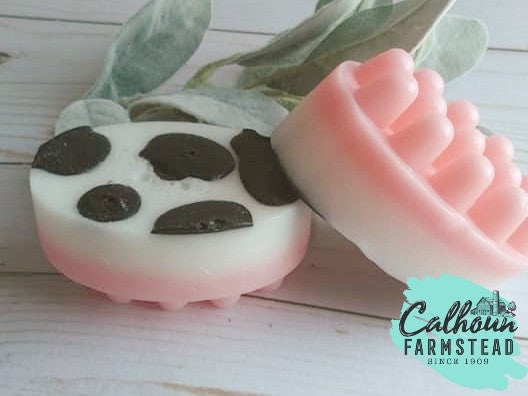 cow print goats milk soap. pink udder detail. massage soap. made by Calhoun Farm. Kids soap, barn yard theme.