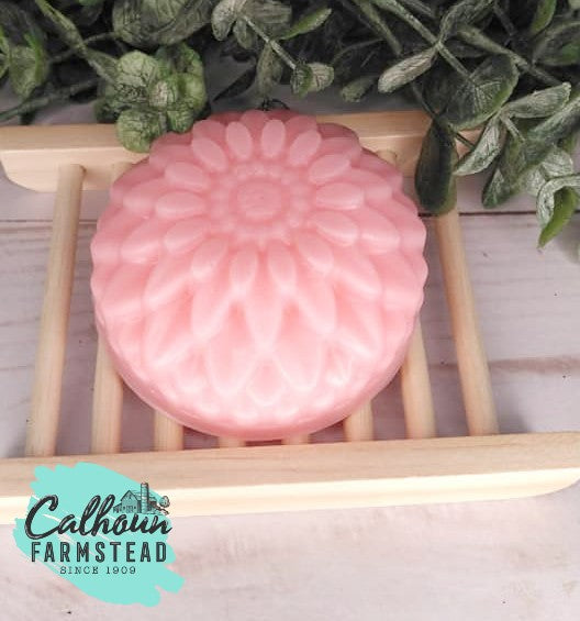 Pink goats milk soap flower shapes. Scented with honeysuckle. For mothers day, gifts. Guest soaps.