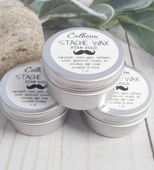 Mustache wax tins. For styling facial hair. Use with beard oil or beard balm for smoothing and styling mustaches. Made by Calhoun Farm.