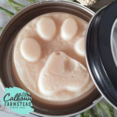 paw wax in tin. for protecting dogs paws from hot concrete and cold snow and salt burns.