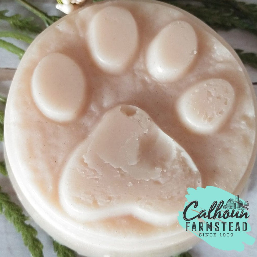 paw wax puck for dogs paws. protecting against salt burns.